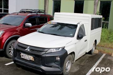 2022 Mitsubishi Strada C/C w/ FB Body Dual A/C, M/T, DSL 65T photo 1